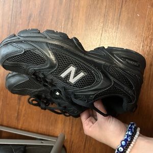 black new balance 530 sneakers